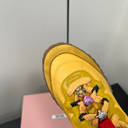 TYRE SNEAKERS IN YELLOW TECHNICAL FABRIC AND SUEDE WITH STICKER