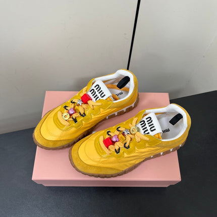 TYRE SNEAKERS IN YELLOW TECHNICAL FABRIC AND SUEDE WITH STICKER