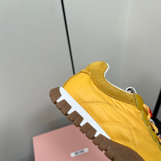 TYRE SNEAKERS IN YELLOW TECHNICAL FABRIC AND SUEDE WITH STICKER