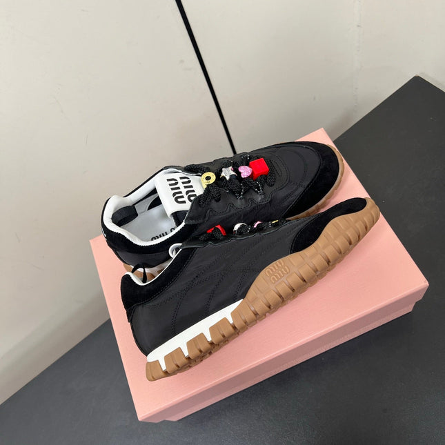 TYRE SNEAKERS IN BLACK TECHNICAL FABRIC AND SUEDE WITH STICKER