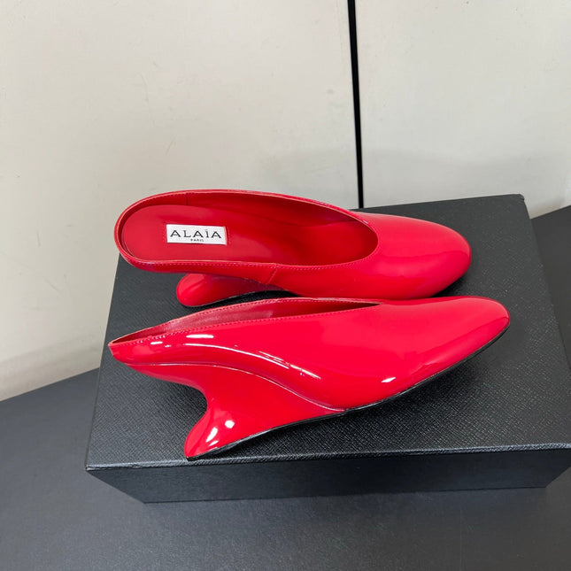 ALAIA WEDGE MULES 25S IN RED LAMBSKIN