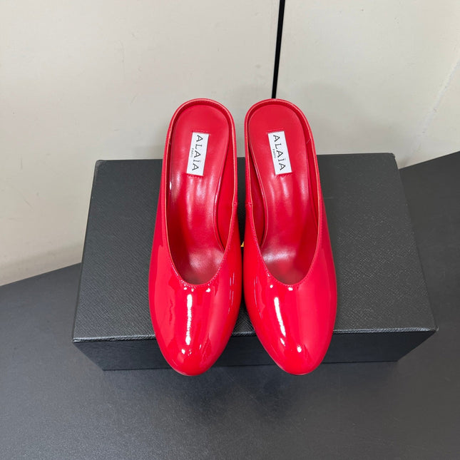 ALAIA WEDGE MULES 25S IN RED LAMBSKIN