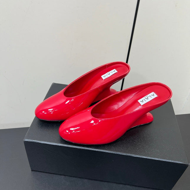 ALAIA WEDGE MULES 25S IN RED LAMBSKIN