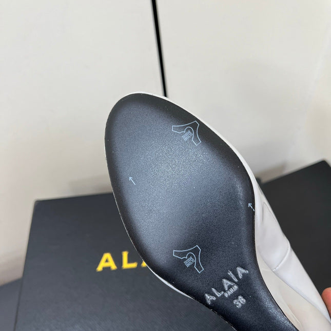 ALAIA WEDGE MULES 25S IN WHITE LAMBSKIN