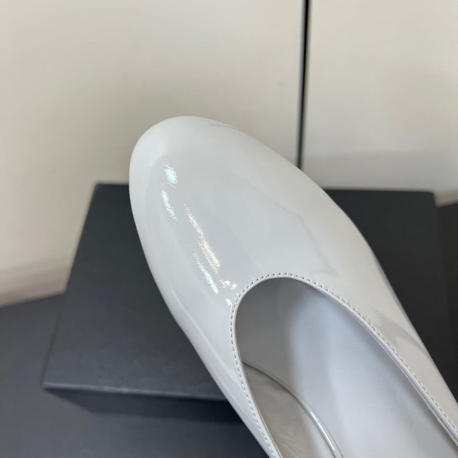 ALAIA WEDGE MULES 25S IN WHITE LAMBSKIN