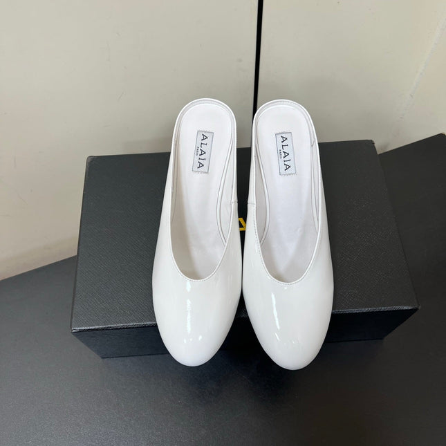 ALAIA WEDGE MULES 25S IN CREAM WHITE LAMBSKIN