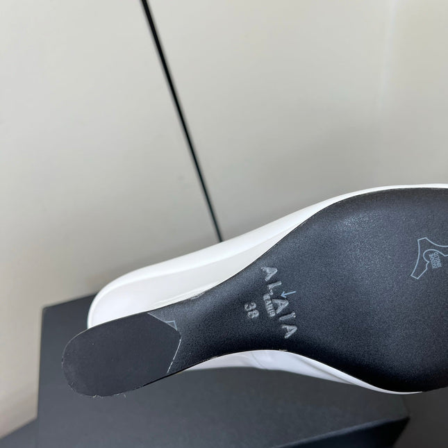 ALAIA WEDGE MULES 25S IN CREAM WHITE LAMBSKIN