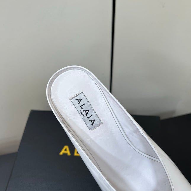 ALAIA WEDGE MULES 25S IN CREAM WHITE LAMBSKIN
