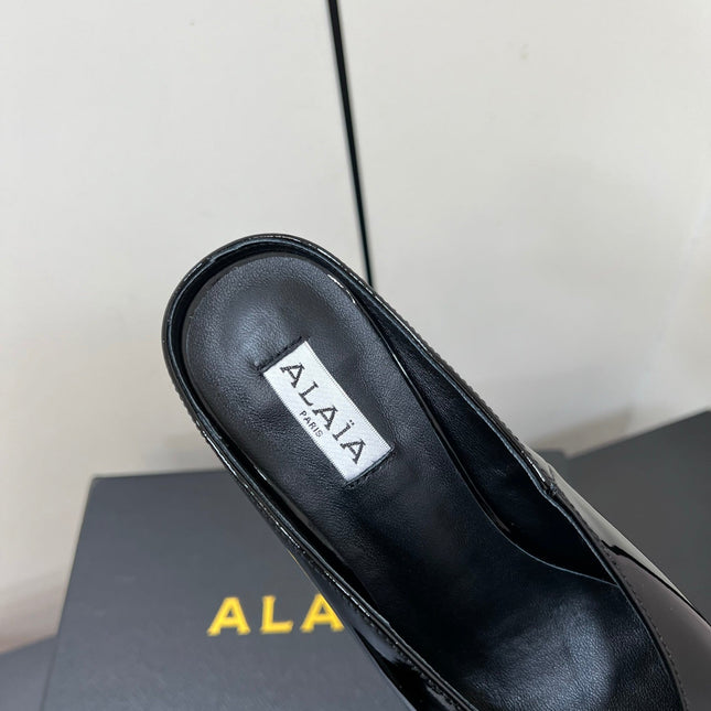 ALAIA WEDGE MULES 25S IN BLACK LAMBSKIN