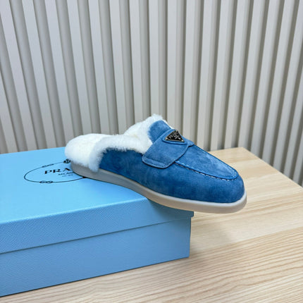 TRIANGLE LOGO FLATS IN AZURE BLUE SUEDE AND FUR LINING