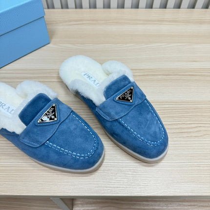 TRIANGLE LOGO FLATS IN AZURE BLUE SUEDE AND FUR LINING