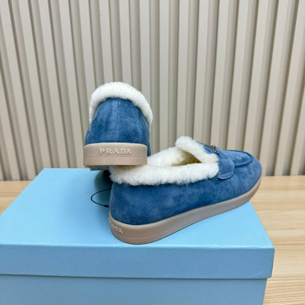 LOAFER IN AZURE BLUE SUEDE AND FUR LINING ATTACHED TRIANGLE LOGO