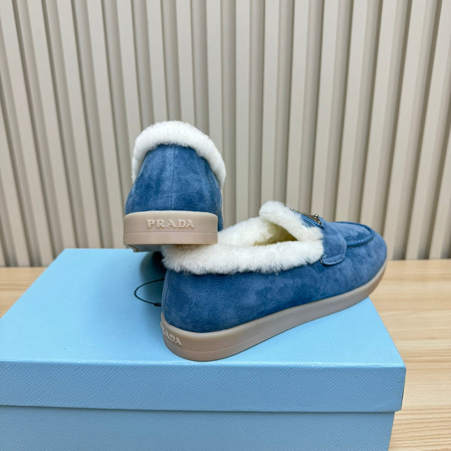 LOAFER IN AZURE BLUE SUEDE AND FUR LINING ATTACHED TRIANGLE LOGO