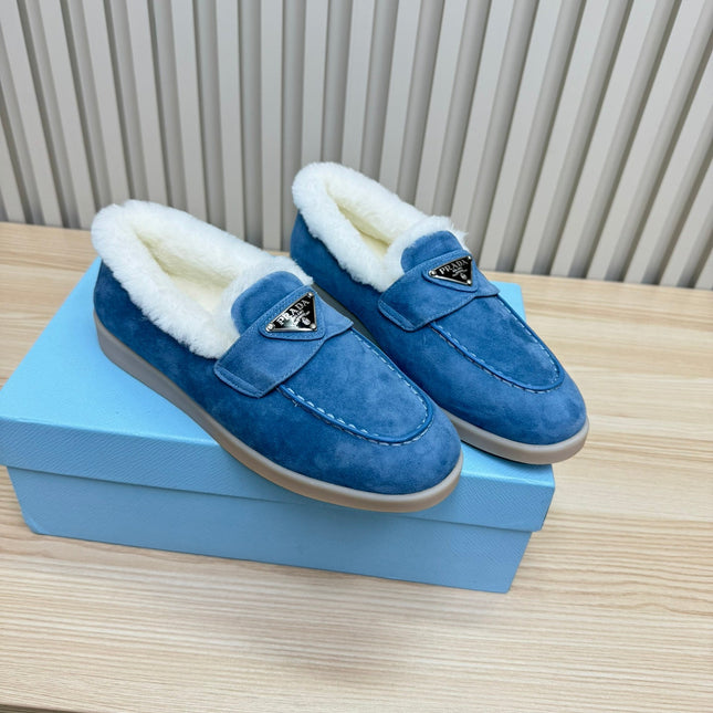 LOAFER IN AZURE BLUE SUEDE AND FUR LINING ATTACHED TRIANGLE LOGO
