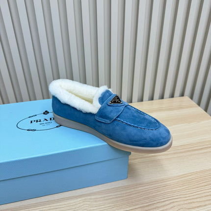 LOAFER IN AZURE BLUE SUEDE AND FUR LINING ATTACHED TRIANGLE LOGO