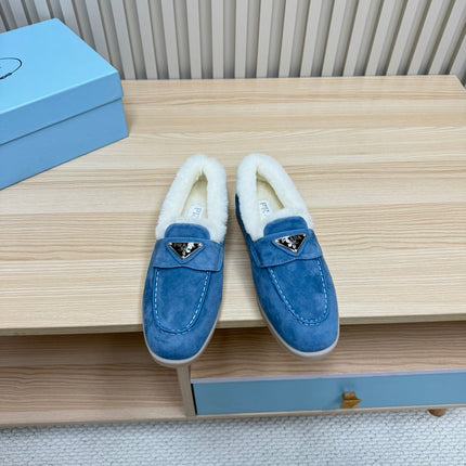 LOAFER IN AZURE BLUE SUEDE AND FUR LINING ATTACHED TRIANGLE LOGO