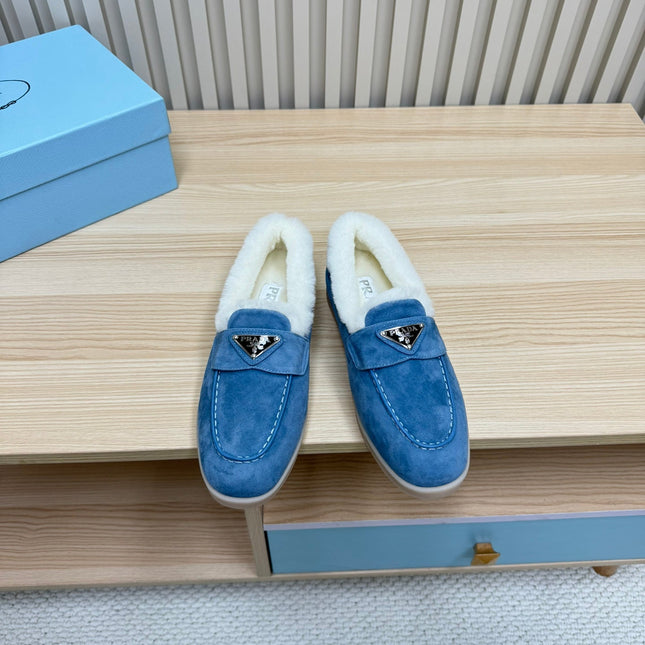LOAFER IN AZURE BLUE SUEDE AND FUR LINING ATTACHED TRIANGLE LOGO