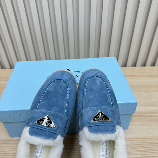 LOAFER IN AZURE BLUE SUEDE AND FUR LINING ATTACHED TRIANGLE LOGO