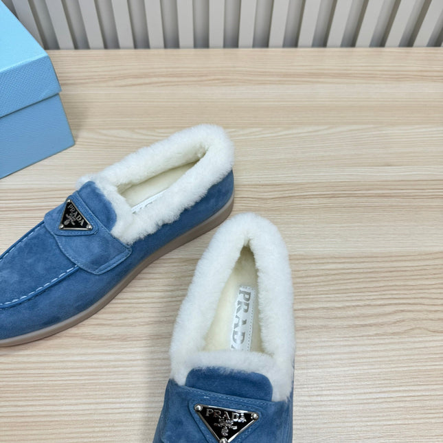 LOAFER IN AZURE BLUE SUEDE AND FUR LINING ATTACHED TRIANGLE LOGO