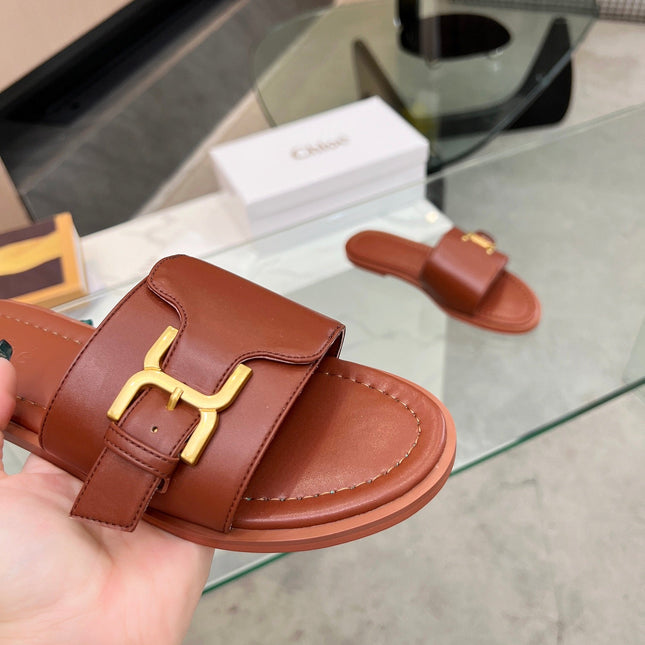 MARCIE SLIDE IN UMBER BROWN CALFSKIN WITH GOLD HARDWARE