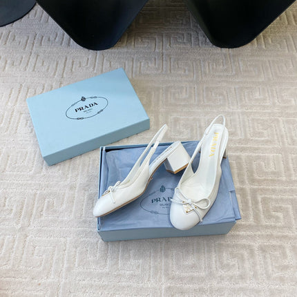 TRIANGLE LOGO SLINGBACK PUMPS WITH BOW IN WHITE CALFSKIN