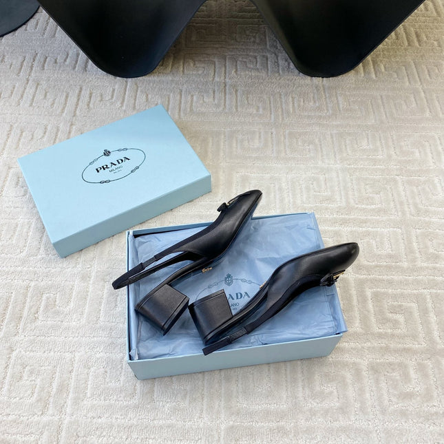 TRIANGLE LOGO SLINGBACK PUMPS WITH BOW IN BLACK CALFSKIN