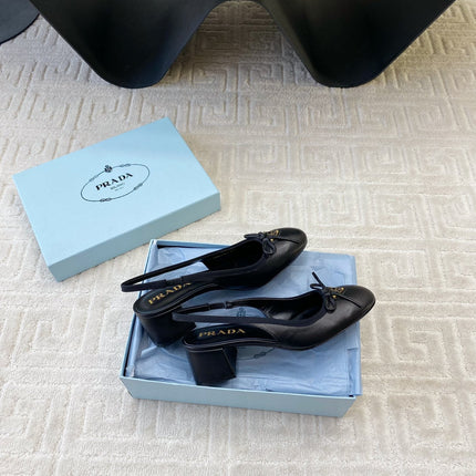 TRIANGLE LOGO SLINGBACK PUMPS WITH BOW IN BLACK CALFSKIN