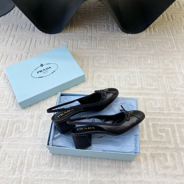 TRIANGLE LOGO SLINGBACK PUMPS WITH BOW IN BLACK CALFSKIN