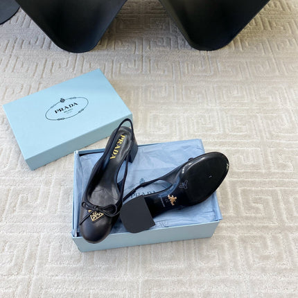 TRIANGLE LOGO SLINGBACK PUMPS WITH BOW IN BLACK CALFSKIN