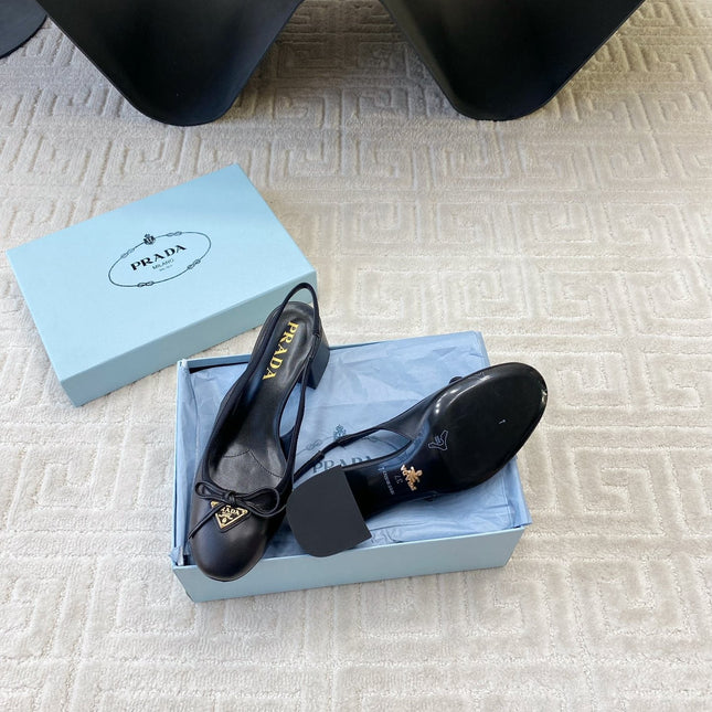 TRIANGLE LOGO SLINGBACK PUMPS WITH BOW IN BLACK CALFSKIN