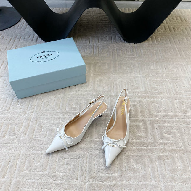 SLINGBACK PUMPS ATTACHED BOW IN WHITE GLOSSY CALFSKIN