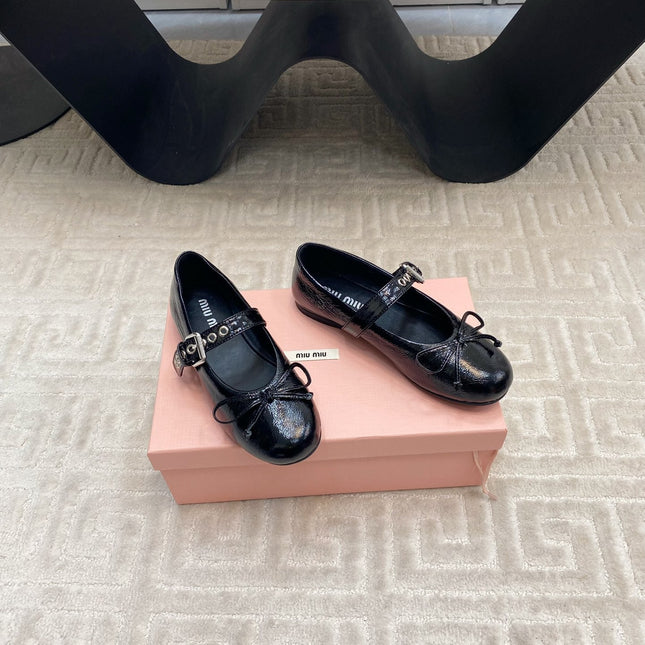 BOW MARY JANE FLAT IN BLACK NAPLAK LAMBSKIN