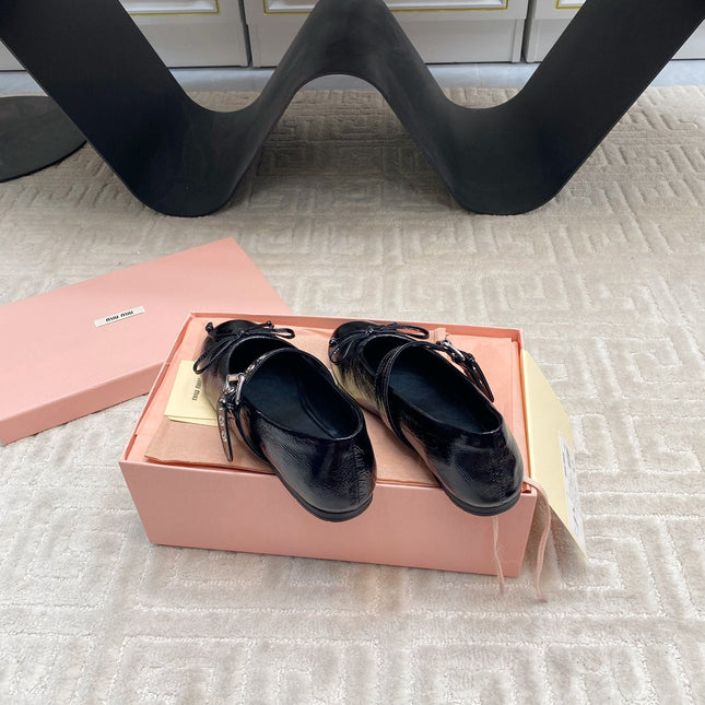 BOW MARY JANE FLAT IN BLACK NAPLAK LAMBSKIN