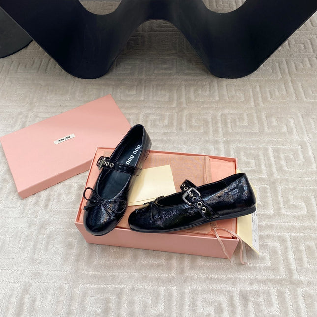 BOW MARY JANE FLAT IN BLACK NAPLAK LAMBSKIN