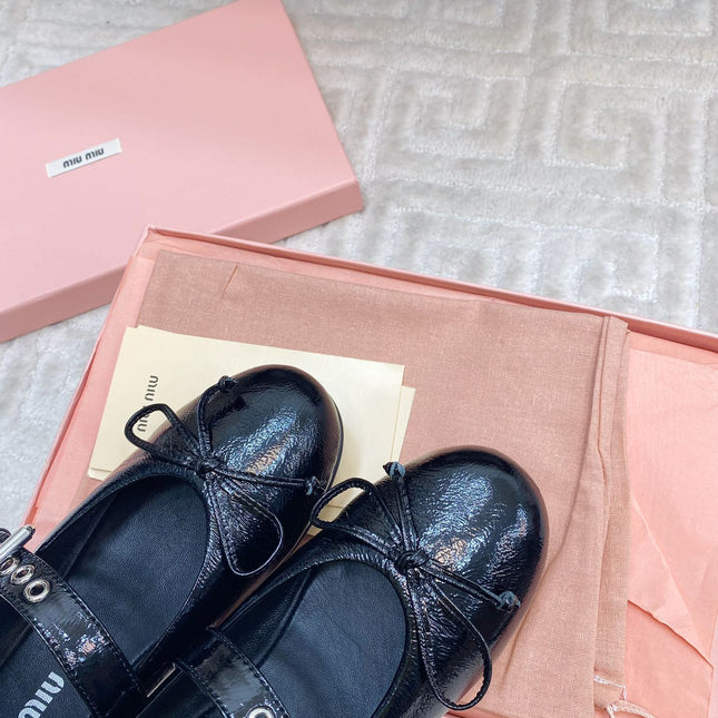 BOW MARY JANE FLAT IN BLACK NAPLAK LAMBSKIN