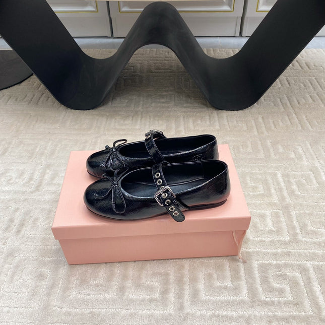 BOW MARY JANE FLAT IN BLACK NAPLAK LAMBSKIN