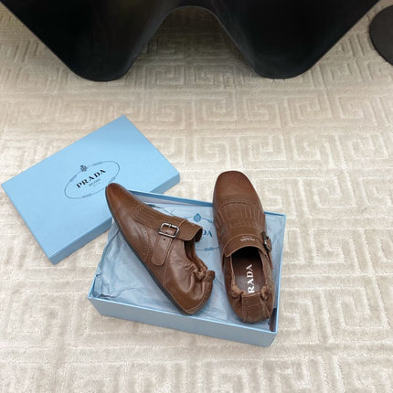 TASSEL LOAFERS IN RUSSET BROWN LAMBSKIN