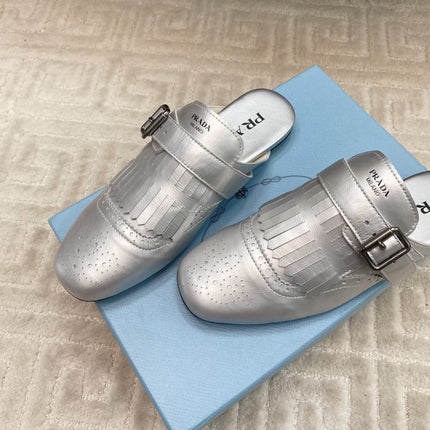 TASSEL MULES IN SILVER METALLIC LAMBSKIN