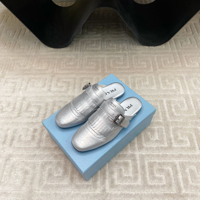 TASSEL MULES IN SILVER METALLIC LAMBSKIN