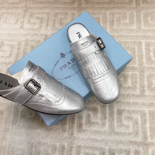TASSEL MULES IN SILVER METALLIC LAMBSKIN