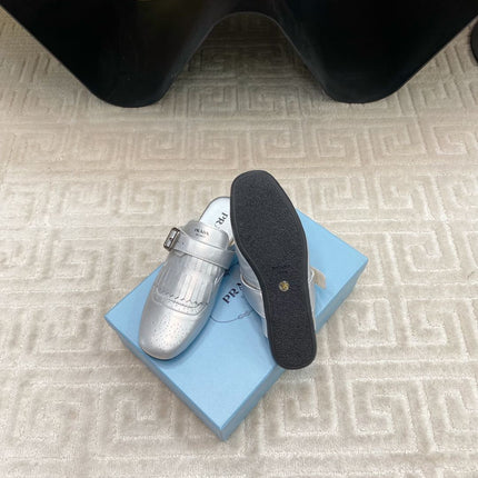 TASSEL MULES IN SILVER METALLIC LAMBSKIN