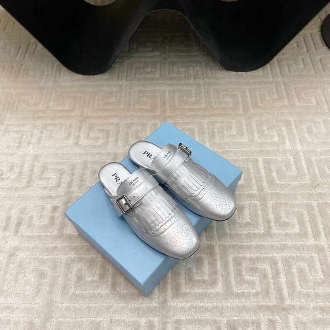 TASSEL MULES IN SILVER METALLIC LAMBSKIN