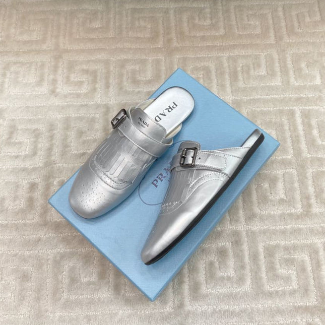 TASSEL MULES IN SILVER METALLIC LAMBSKIN