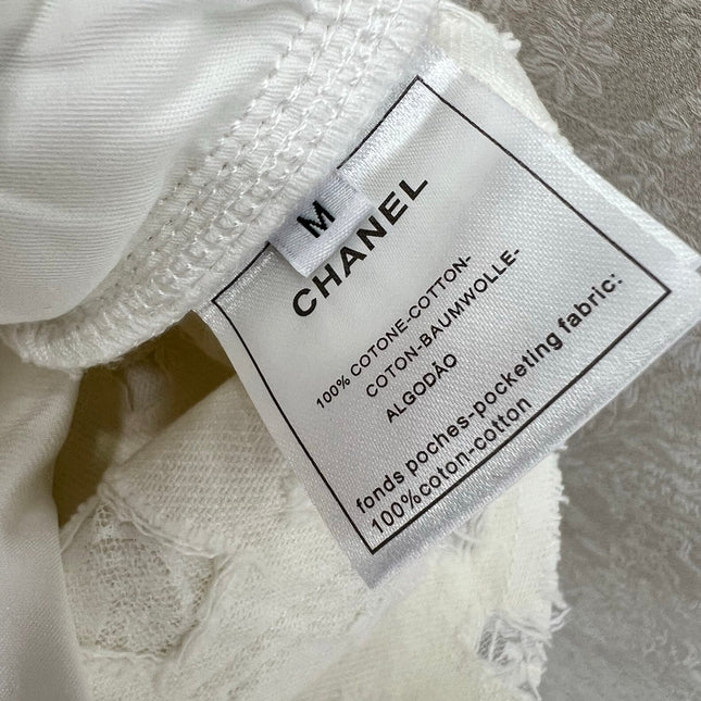 CHANEL LACE-TRIMMED DENIM SHORTS 275066