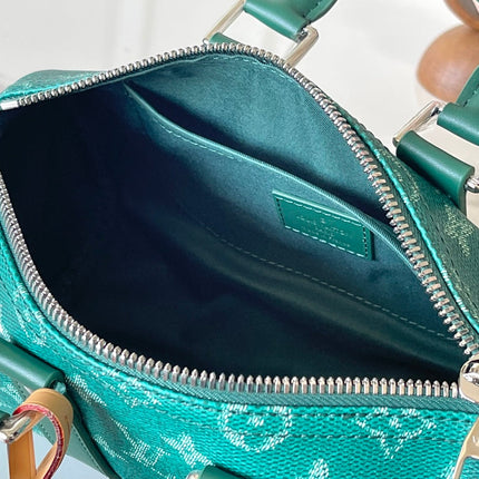 KEEPALL BANDOULIÈRE 25 IN GREEN MONOGRAM HERITAGE CANVAS