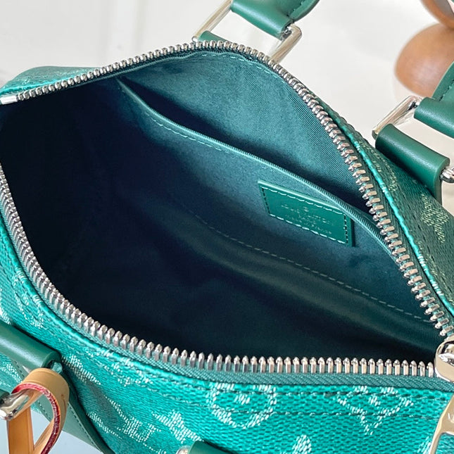 KEEPALL BANDOULIÈRE 25 IN GREEN MONOGRAM HERITAGE CANVAS