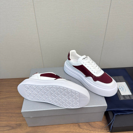 PRADA 25S DOWNTOWN BOLD SNEAKERS 45MM IN WHITE AND BURGUNDY CALFSKIN