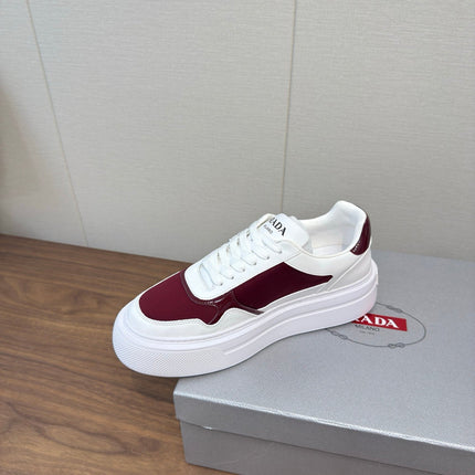 PRADA 25S DOWNTOWN BOLD SNEAKERS 45MM IN WHITE AND BURGUNDY CALFSKIN