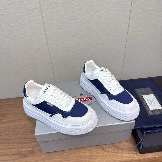 PRADA 25S DOWNTOWN BOLD SNEAKERS 45MM IN WHITE AND NAVY BLUE CALFSKIN