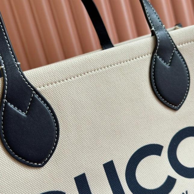 TOTE BAG PRINTED LOGO 41.5 IN WHITE CANVAS DARK BLUE CALFSKIN